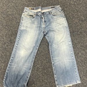 Distressed relaxed jeans